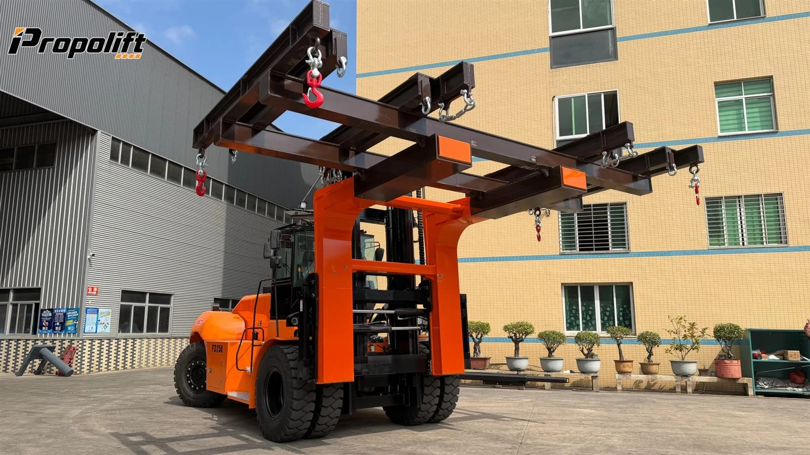 heavy forklift with lift beam to move over-sized precast structures heavy forklift with lift beam to move over-sized precast structures